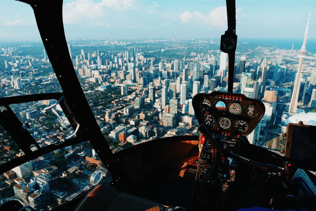 helicopter-flying-over-city