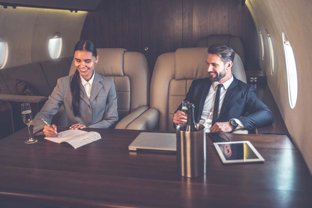 business passengers traveling on a private jet