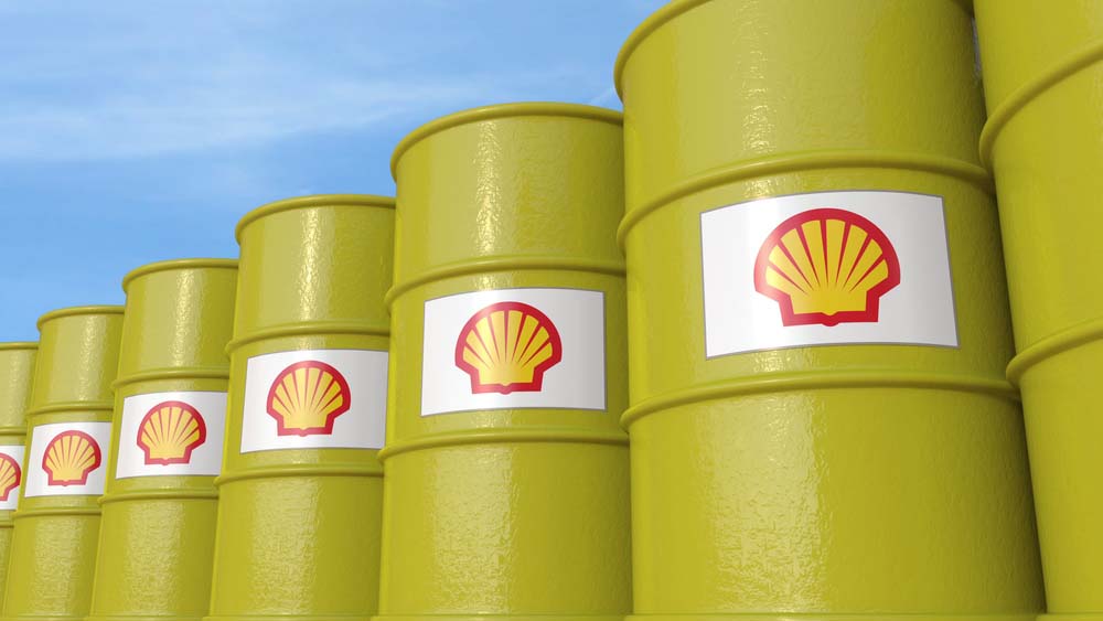 A row of green barrels with Shell's logo on them.